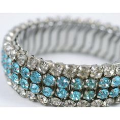 This is part of Chairish’s Costume Jewelry assortment.  1940's stretch metal bracelet of clear and turquoise rhinestones. Turquoise, Metal Bracelet, Decor Guide, 1940s Fashion, Rhinestone Bracelet, Metal Bracelets, Clear Rhinestones, Costume Jewelry, Vintage Antiques