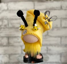 "This Adorable Bumble Bee Bearded Gnome is Ready to Ship in 3 to 5 Days He is so Cute and he will come with a Beard, a Large Gnomish nose and a Soft Yellow Hat that is adorned with Bumble Bee Antennas, Bumble Bees and he is wearing Slide Sandals.      All of The Warm Barn Gnomes are Unique and no TWO Gnomes are Identical.  They are Handmade in my Home and they are intended for display/decoration in your Home.  They are NOT intended to be used as a TOY. This Gnome is NOT MADE with a Styrofoam Cone.  The Body is MADE with Polly Fill and Polly Pellets for Weight and Stability.  The Nose is NOT a Wooden Ball.  My Noses are Built into the body giving each Gnome its own Personality and Extra Cuteness. Please Note:  This Gnome is approximately 8\" tall x 5\" wide and is MADE TO ORDER and there ca