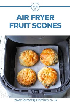 four biscuits in an air fryer with text overlay that says air fryer fruit scones