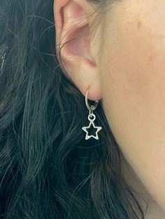 Our simple, affordable silver star earrings are the perfect accessory for any outfit. Add a little edge to your look! These earrings are great for casual wear or for dressing up your makeup on the weekend. Pair them with any outfit from jeans to a cocktail dress. They're cute, dainty and easy to wear - just add these to your cart today! Lever back to secure, these 'huggie' earrings are the perfect gift for someone or for yourself! * Listing is for one (1) pair of star earrings. Processing + Ship Star Earrings Silver, Star Hoop Earrings, Silver Star Earrings, Negroni, Funky Jewelry, Earrings Hoop, Star Gift, Huggie Earrings, Silver Star