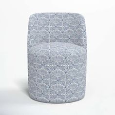 a blue and white patterned chair on a white background