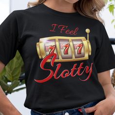 a woman wearing a black t - shirt that says i feel sixty and has a slot machine on it