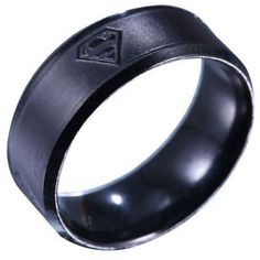 an image of a ring that is made out of stainless steel and has a cross on it