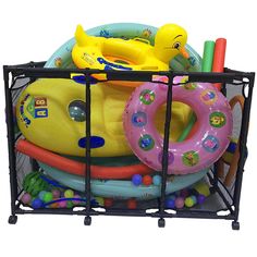 an inflatable pool with various toys and floats on it's back end