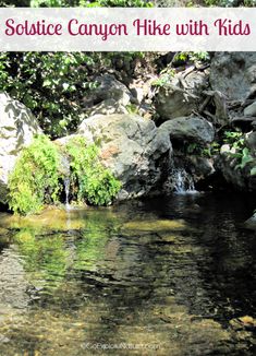 a small pond surrounded by rocks and trees with text overlay saying solstic canyon hike with kids