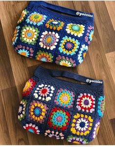 two crocheted purses sitting on top of a wooden floor next to each other