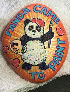 a button that says panda came to san francisco with a cartoon character holding a paintbrush