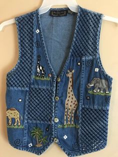 New Direction Petite Medium Denim Safari Vest Lattice Weave Pattern 🐘🐪🦒. Very nice preowned condition. Appliquéd elephant, giraffe, camel, palm tree. Lattice weave pattern on front Denim Jackets, Textile Art, Safari Vest, Ladies Vest, Denim Ideas, Weave Pattern, New Directions, Jean Jackets, Denim Vest