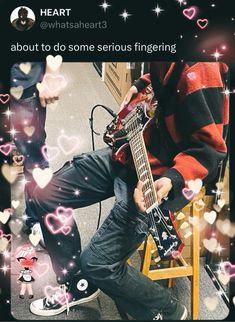 a man sitting on top of a chair with a guitar in front of his face