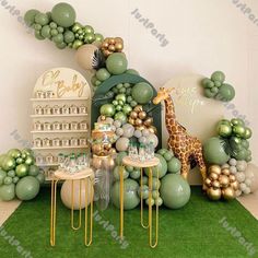 a giraffe themed birthday party with balloons and decorations