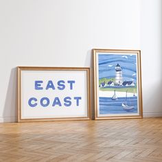 two framed art prints sitting on top of a hard wood floor