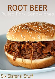 a close up of a sandwich on a plate with the words root beer pulled pork sandwiches