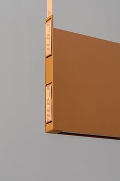 a close up of a brown box on a gray background