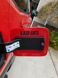 a jeep door handle with the word jeep juice on it