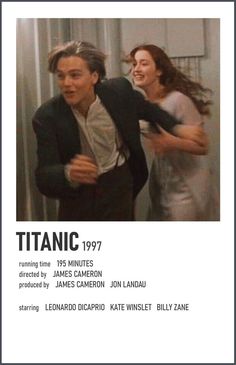 a man and woman are dancing together in front of a poster for the movie titanic