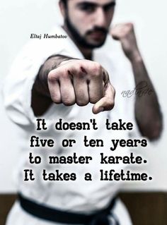 a man pointing his finger at the camera with a quote on it that says, the black belt represents the never ending quest to perfect the mind, body and soul