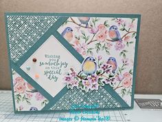 a close up of a card with flowers and birds on it, which says wishing no much joy at this special day