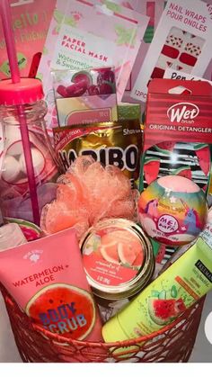 a pink basket filled with lots of different items