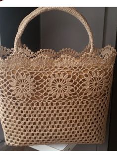 a crocheted bag sitting on top of a table