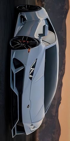 an aerial view of a futuristic sports car