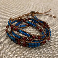 Nwot! Women’s Wrap Around Beaded Bracelet Gorgeous Wrap Bracelet In A Palette Of Colors That Includes Different Shades Of Red As Well As Blue, Aqua, Turquoise And Copper-Color Beads. The Bracelet Is Designed To Wrap Around The Wrist Approximately Five Times. Avoid Contact With Water. Button Clasp. Will Wrap With Care Wrap Around Bracelet, Different Shades Of Red, Beaded Leather Wraps, Boho Men, Aqua Turquoise, Bead Leather, Leather Wrap Bracelet, Photo Bracelet, Copper Color