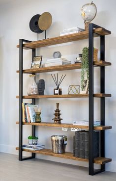 a book shelf with books and other items on it