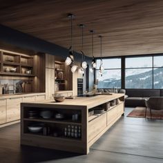 a large kitchen with wooden cabinets and an island in front of a window that overlooks the mountains