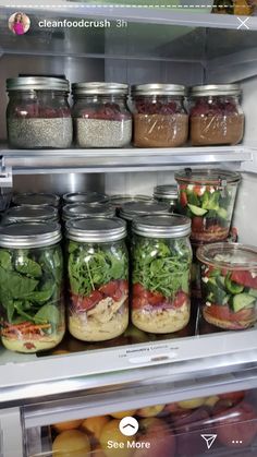 an open refrigerator filled with lots of different types of salads and other food items