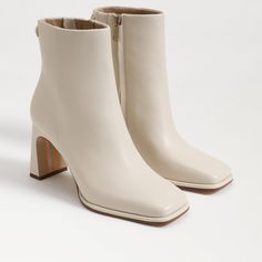 Not your average ankle bootie—Irie gives the perennial favorite bootie a fresh look with an angular square-toe and super-slim block heel.. Heel Height: 3.1 inches. Toe: Rounded Toe. Closure: Zipper. Boot Shaft: 4.9 inches. Calf Circumference: 9.8 inches. Material: Leather. Insole: Synthetic. Timeless Boots, Zipper Boots, Women Men Shoes, Willow Tree, Ankle Bootie, Leather Ankle Boots, Shoes Heels Boots, Winter Women, Sam Edelman