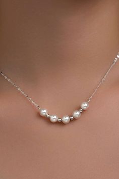 This dainty silver necklace is all one length. Its chain is simple but ends with white pearls. Length: 8 1/2” Delicate Pearl Necklace, Perl Neckles Simple, Senior Hoco, Dainty Silver Necklace, Diy Pearl Necklace, Bday Outfit, Necklace With Pearls, Outfit References, Dainty Chain Necklace