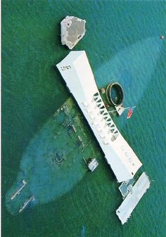 an aerial view of a ship in the water