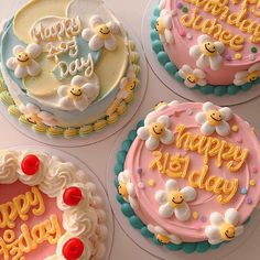 four decorated birthday cakes with the words happy birthday written in frosting on each cake