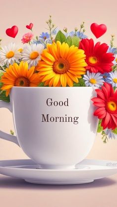 a coffee cup filled with colorful flowers on top of a saucer