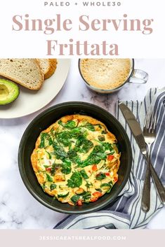 an omelet with spinach and cheese in a skillet on a marble counter top