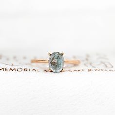 This keepsake memorial ring is created with a sky blue kyanite gemstone & a lock of hair, fur, or pet cremation ashes. ♥ Ring Sizes: 3-12 (half sizes included)  ♥ Materials: Sterling Silver, Rose Gold plating, 14k Gold, 18k Gold ♥ Setting: Prong  ♥ Stone Size: 7x9MM Oval  ♥  Hair/Fur/Pet Ash Collection: After purchasing, instructions will be on the emailed receipt from Etsy sent to the email address of your Etsy account. ♥ Stone production: The stone created for your ring will include the color( Oval Hair, Ashes Ring, Cremation Ring, Non Human, Lock Of Hair, Kyanite Ring, Memorial Ring, Pet Cremation, Pet Ashes