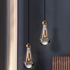 two light bulbs hanging from the ceiling