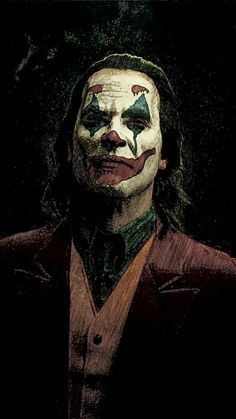 a drawing of the joker with his face painted in green and red, on a black background