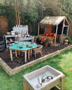 an outdoor kitchen is set up in the yard