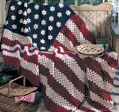 the crochet collection book cover with an american flag on it and baskets in front