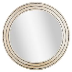 a round mirror with rope around the edges on a white background, it is made out of wood and has a beige frame