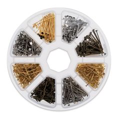 various types of pins and needles in a plastic container