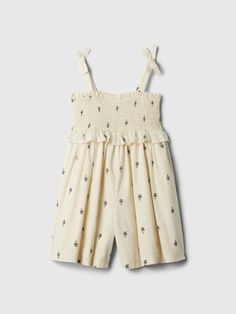 Soft cotton romper.  Square neck, smocked chest.  Tank straps with bows at shoulders.  Certain styles have allover prints.  A-line silhouette. Toddler Boys, Smocked Romper, Cotton Romper, Everything Baby, Child Life, Baby Gap, Toddler Dress, Chinos Pants, New Woman