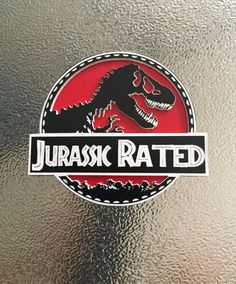 a sticker on the side of a refrigerator that says, jurasic rated