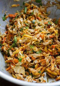 shredded carrots and other vegetables in a bowl