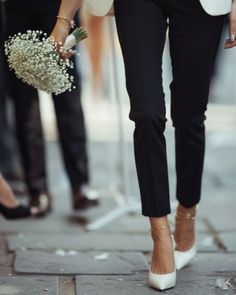 Explore our style guide on whether women can wear pants to a wedding. Find tips on choosing the right pantsuit and how to accessorize for a chic, modern look. Learn about suitable fabrics, colors, and cuts for wedding events. Perfect for guests seeking stylish alternatives to traditional dresses. Pants To A Wedding, Wedding Pants, Wedding Guest Attire, Black Tie Attire