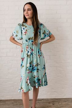 This modest floral dress is mint. It is short sleeve with bell sleeves and midi. It is so cute for spring and summer. Shop now! #modest #floraldress Clubbing Outfits, Cute Floral Dresses, Mesh Bodycon Dress