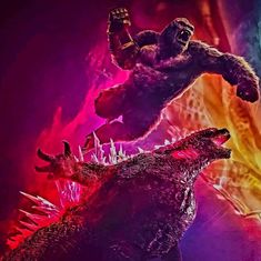 the godzilla is attacking another creature in an action scene