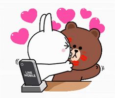 a teddy bear hugging a computer screen with hearts flying around it and the text line mobile