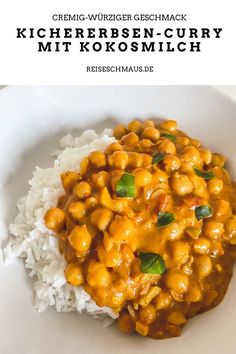 a white plate topped with rice covered in curry