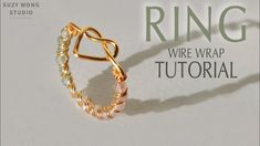 the ring wire wrap is made with gold and pink beads